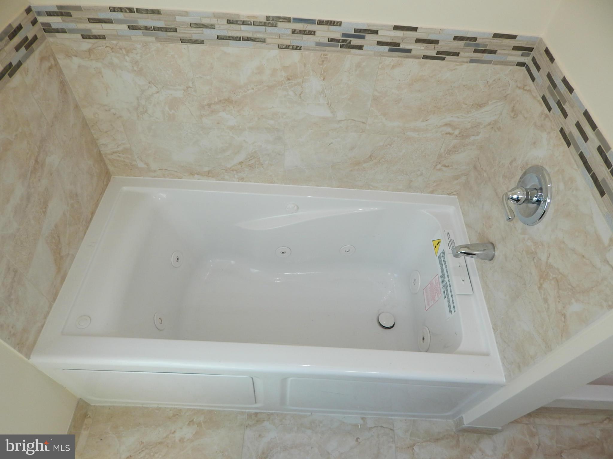 5618 Clearspring Road Baltimore, MD 21212 - Photo 19 of 30 a bathroom with a shower