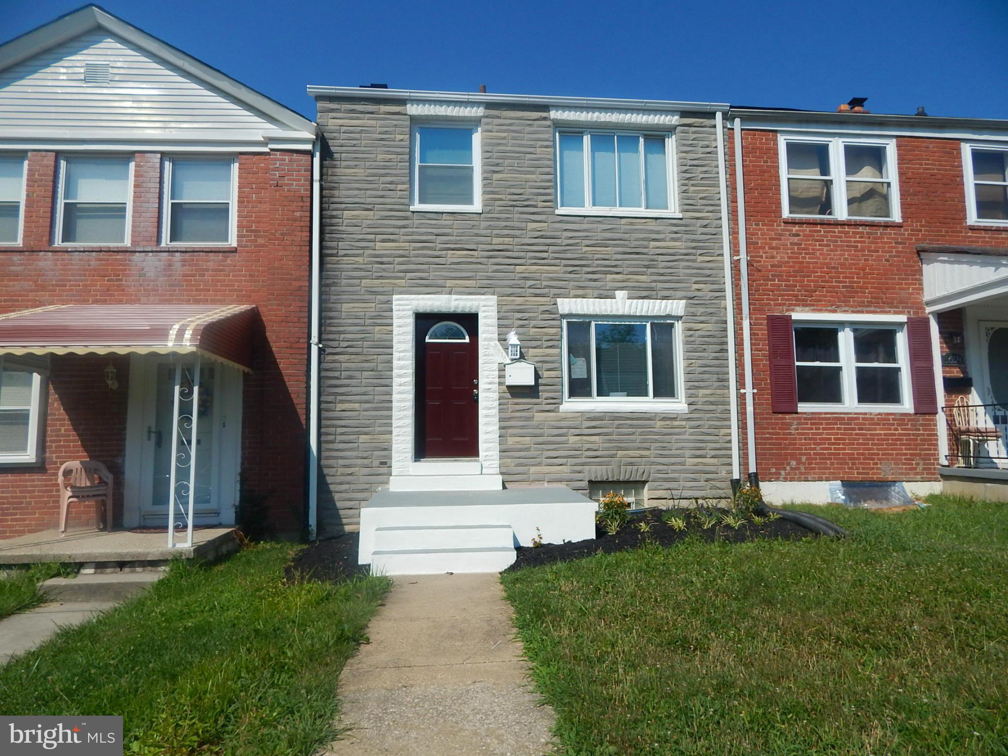 5618 Clearspring Road Baltimore, MD 21212 - Photo 4 of 30 a front view of a house with a yard