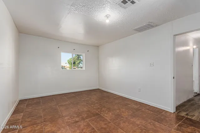 an empty room with windows