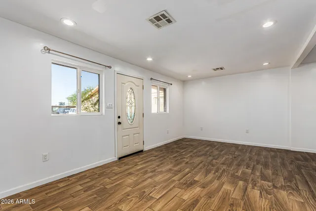 an empty room with windows