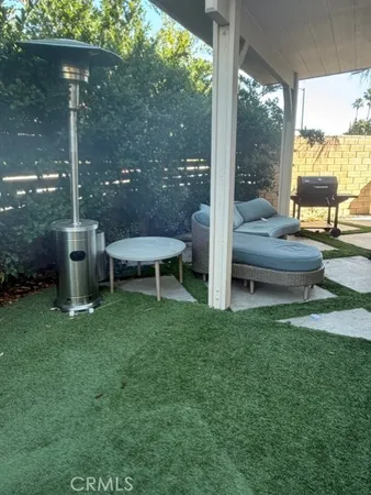 a house view with a garden space