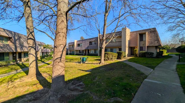 a view of a house with swimming pool