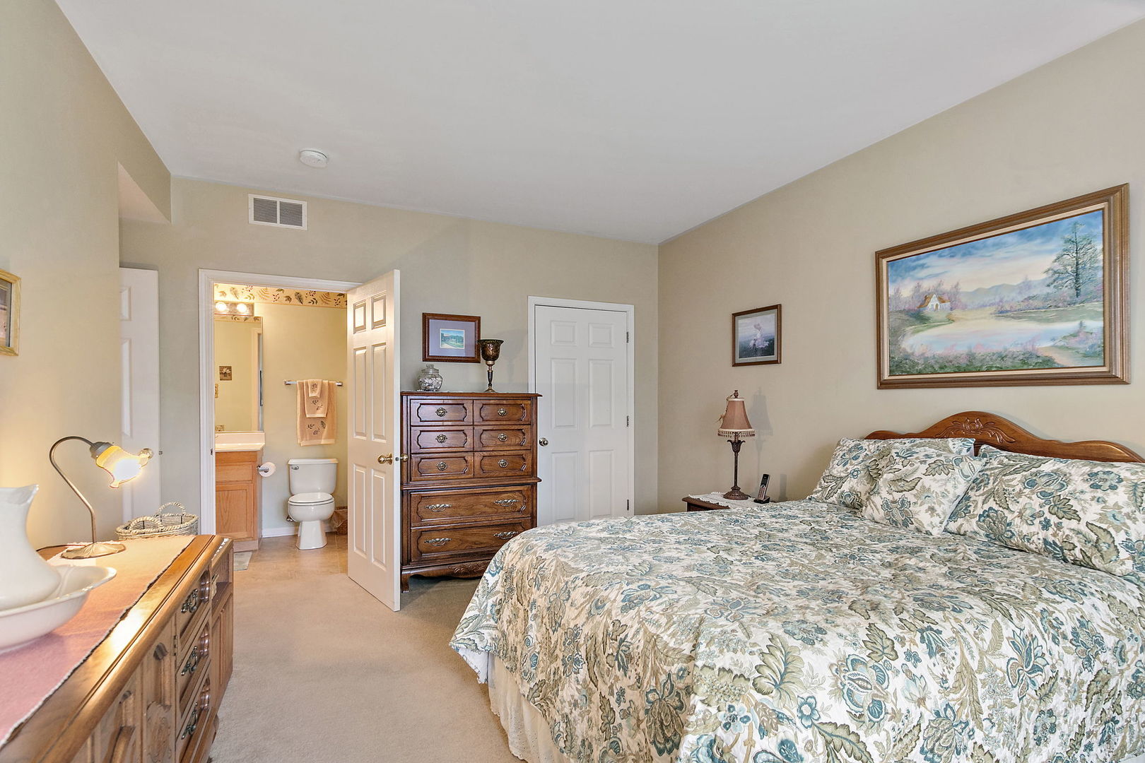 2350 Camden Bay, Unit 2350 Elgin, IL 60123 - Photo 14 of 20 a bedroom with a bed and a cabinets