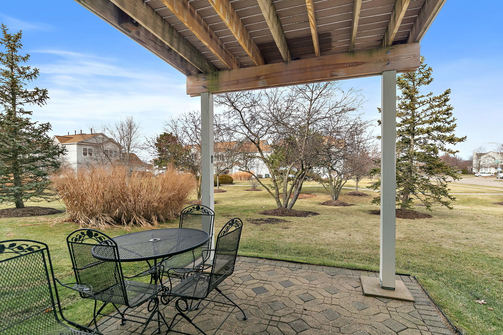 2350 Camden Bay, Unit 2350 Elgin, IL 60123 - Photo 17 of 20 a view of a porch with furniture and yard
