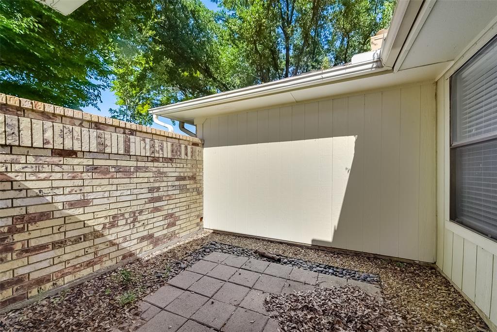 509 Parkway Boulevard Coppell, TX 75019 - Photo 17 of 19 a view of a door and an outdoor space