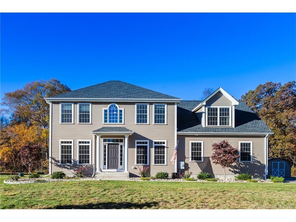 299 Usher Swamp Road Colchester, CT 06415 - Photo 1 of 1 a front view of a house with garden