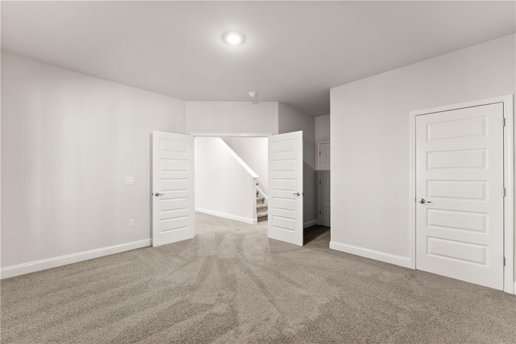 490 Magnolia Grove Place Cornelia, GA 30531 - Photo 18 of 43 an empty room with a empty space