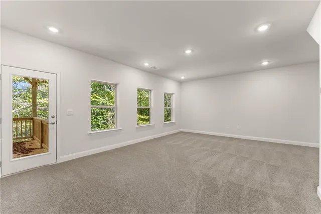 an empty room with windows