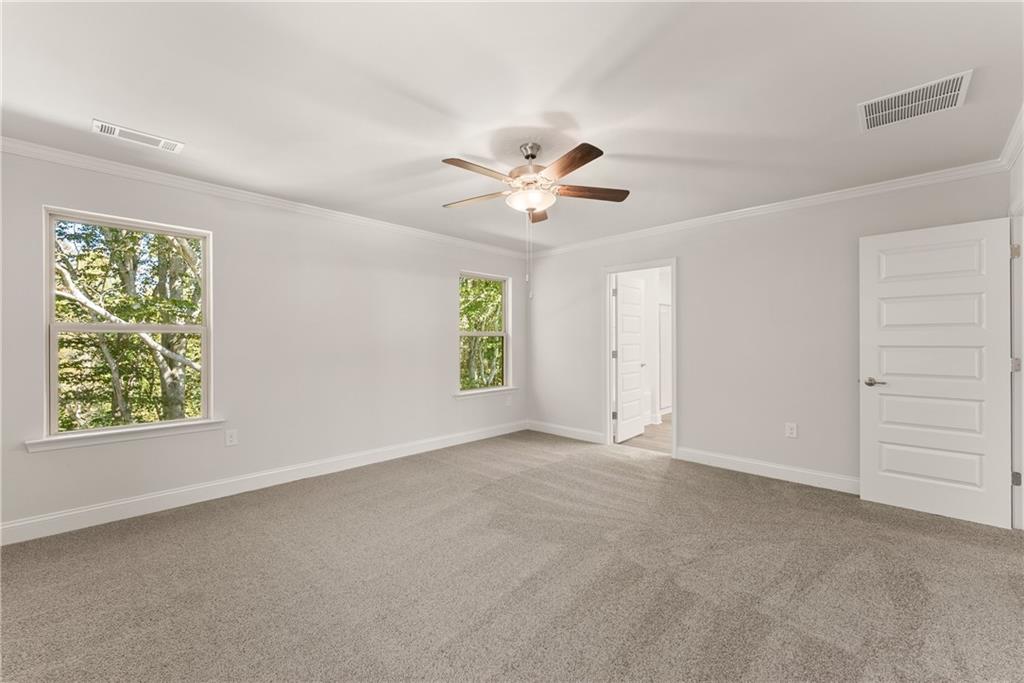 490 Magnolia Grove Place Cornelia, GA 30531 - Photo 34 of 43 a view of an empty room with a window