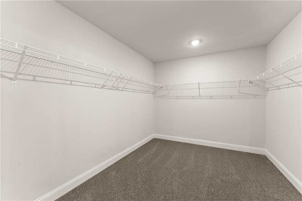 490 Magnolia Grove Place Cornelia, GA 30531 - Photo 36 of 43 a view of a room with racks on the wall