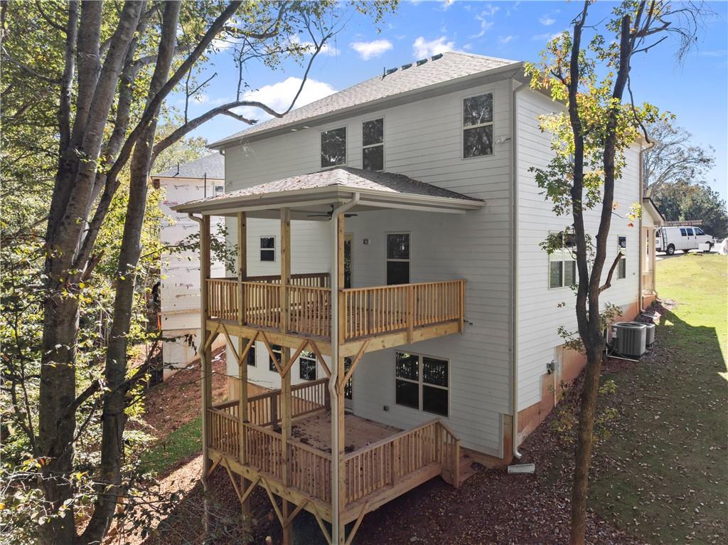 490 Magnolia Grove Place Cornelia, GA 30531 - Photo 41 of 43 a view of a house with a yard