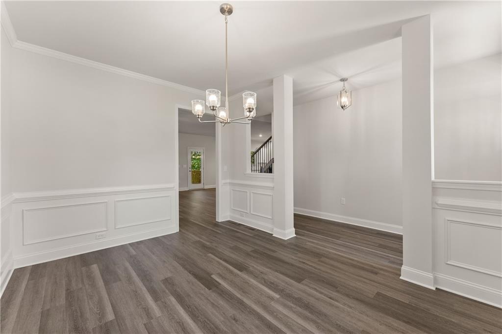 490 Magnolia Grove Place Cornelia, GA 30531 - Photo 7 of 43 a view of empty room with wooden floor