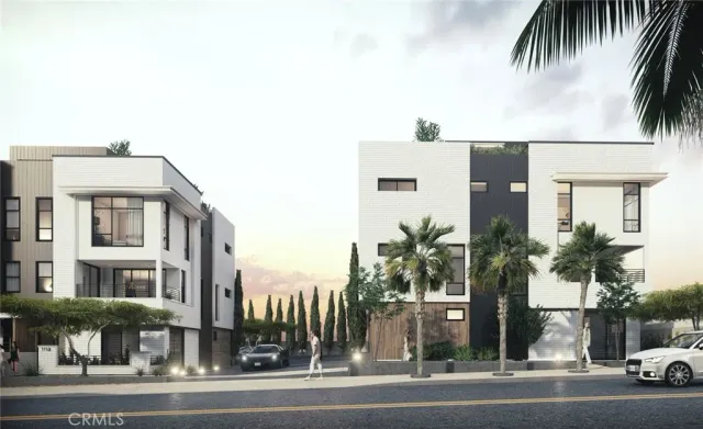 a view of a street with a building in the background