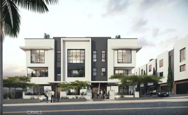 a view of a building and a cars park