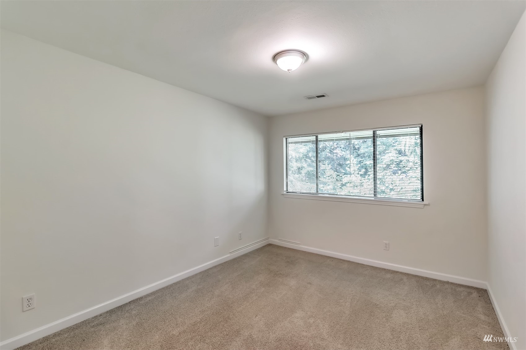 11201 3rd Avenue Southeast, Unit 1B Everett, WA 98208 - Photo 11 of 15 an empty room with a window