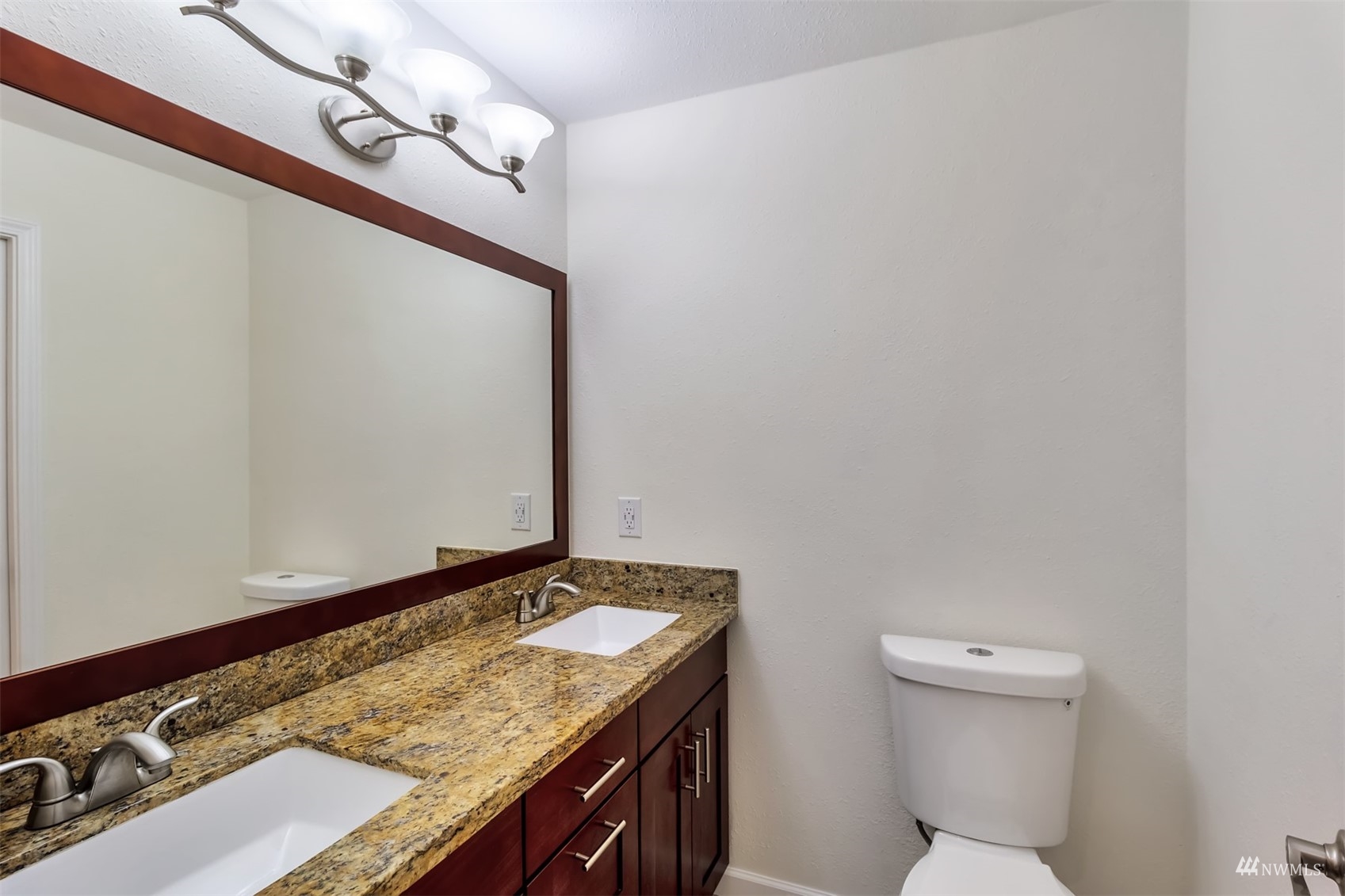 11201 3rd Avenue Southeast, Unit 1B Everett, WA 98208 - Photo 15 of 15 a bathroom with a sink and a toilet