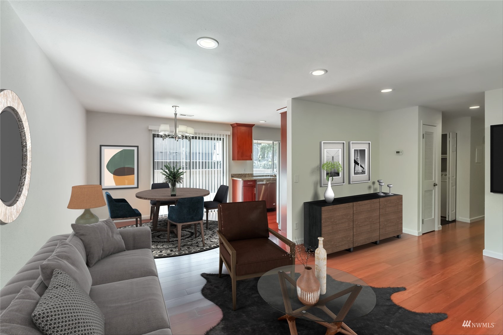 11201 3rd Avenue Southeast, Unit 1B Everett, WA 98208 - Photo 5 of 15 a living room with furniture and a wooden floor