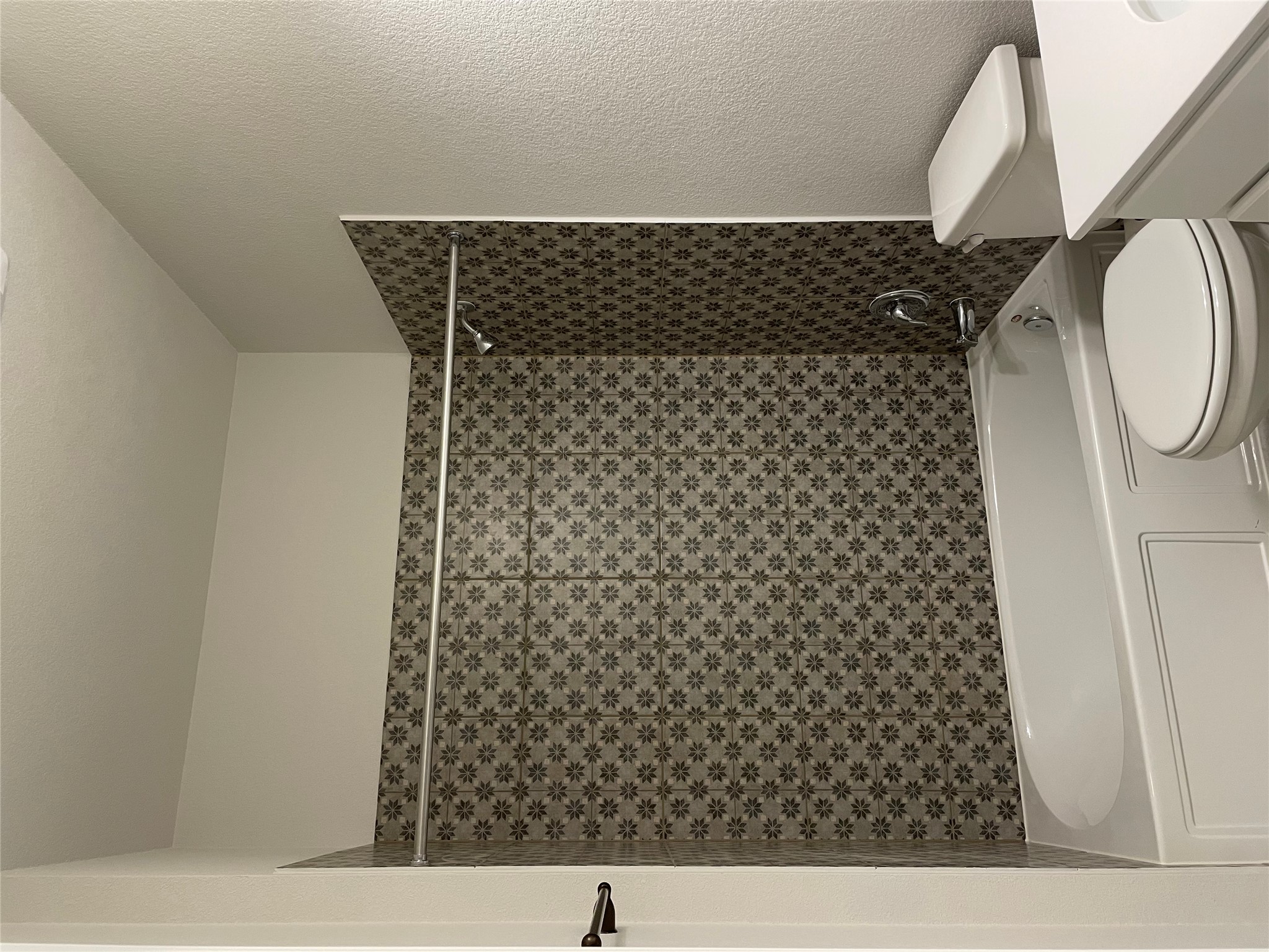 3908 Birdwatch Loop, Unit 56 Pflugerville, TX 78660 - Photo 13 of 30 a bathroom with a bathtub and a toilet