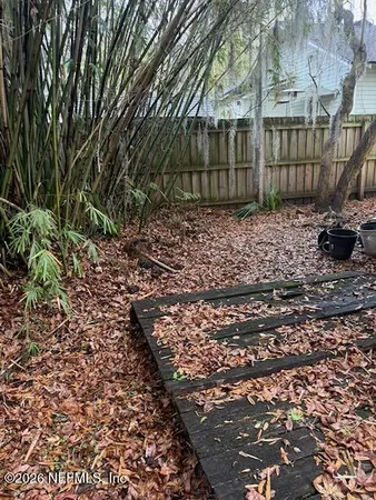a view of a backyard of the house