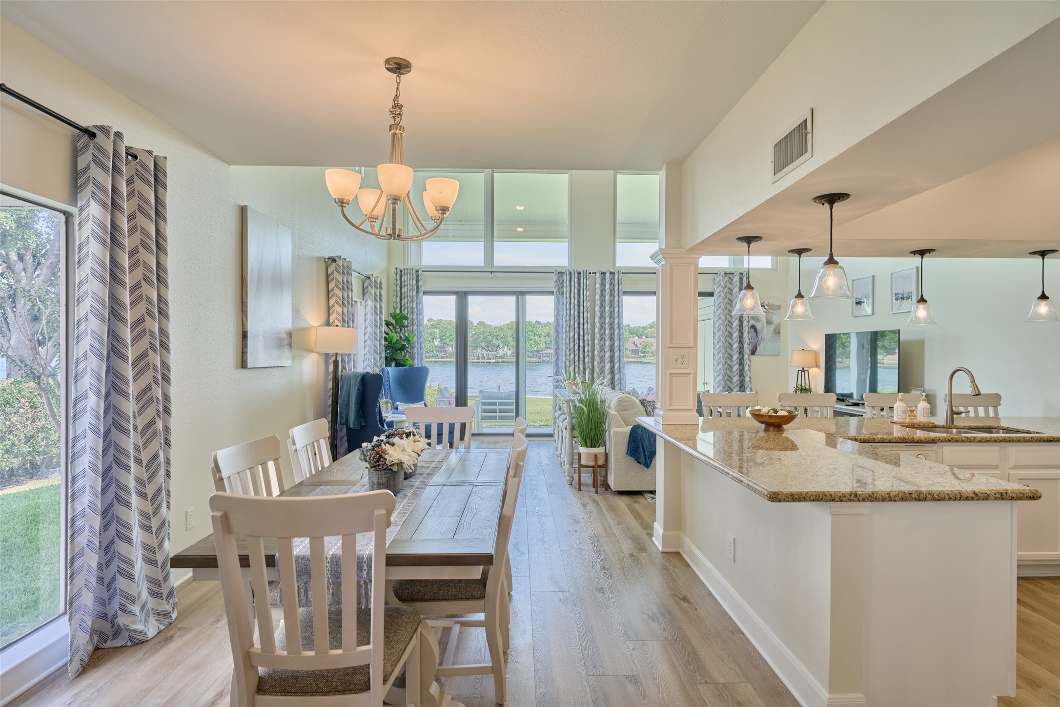 73 April Point Drive South Montgomery, TX 77356 - Photo 12 of 42 Dining area is positioned alongside the kitchen with barstools to offer many seating options.