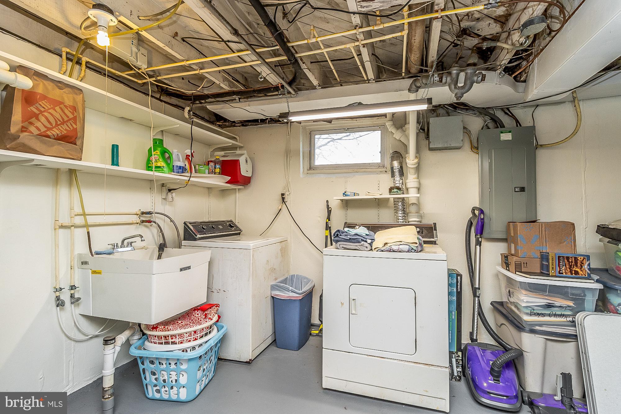 2645 Spring Road Parkville, MD 21234 - Photo 39 of 47 Functional laundry space with ample storage.