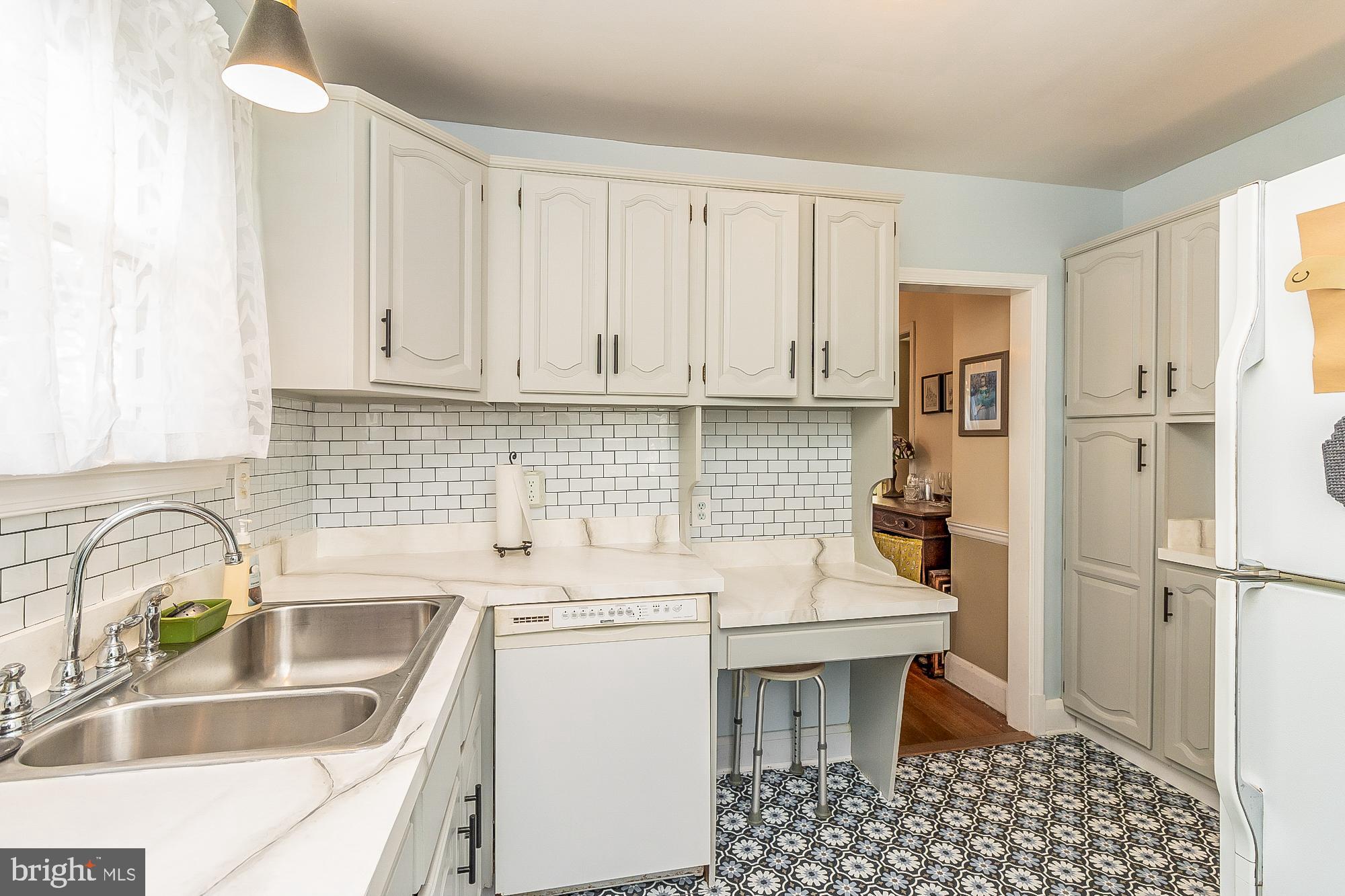 2645 Spring Road Parkville, MD 21234 - Photo 9 of 47 Charming kitchen with faux-tile accents.