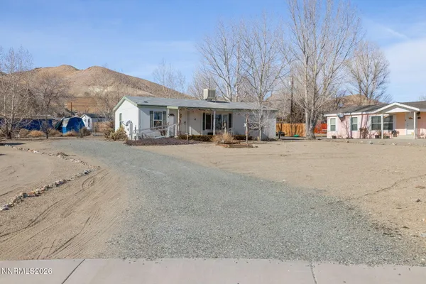 front view of a house with a road