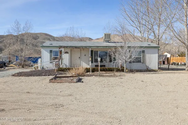a view of a house with a patio