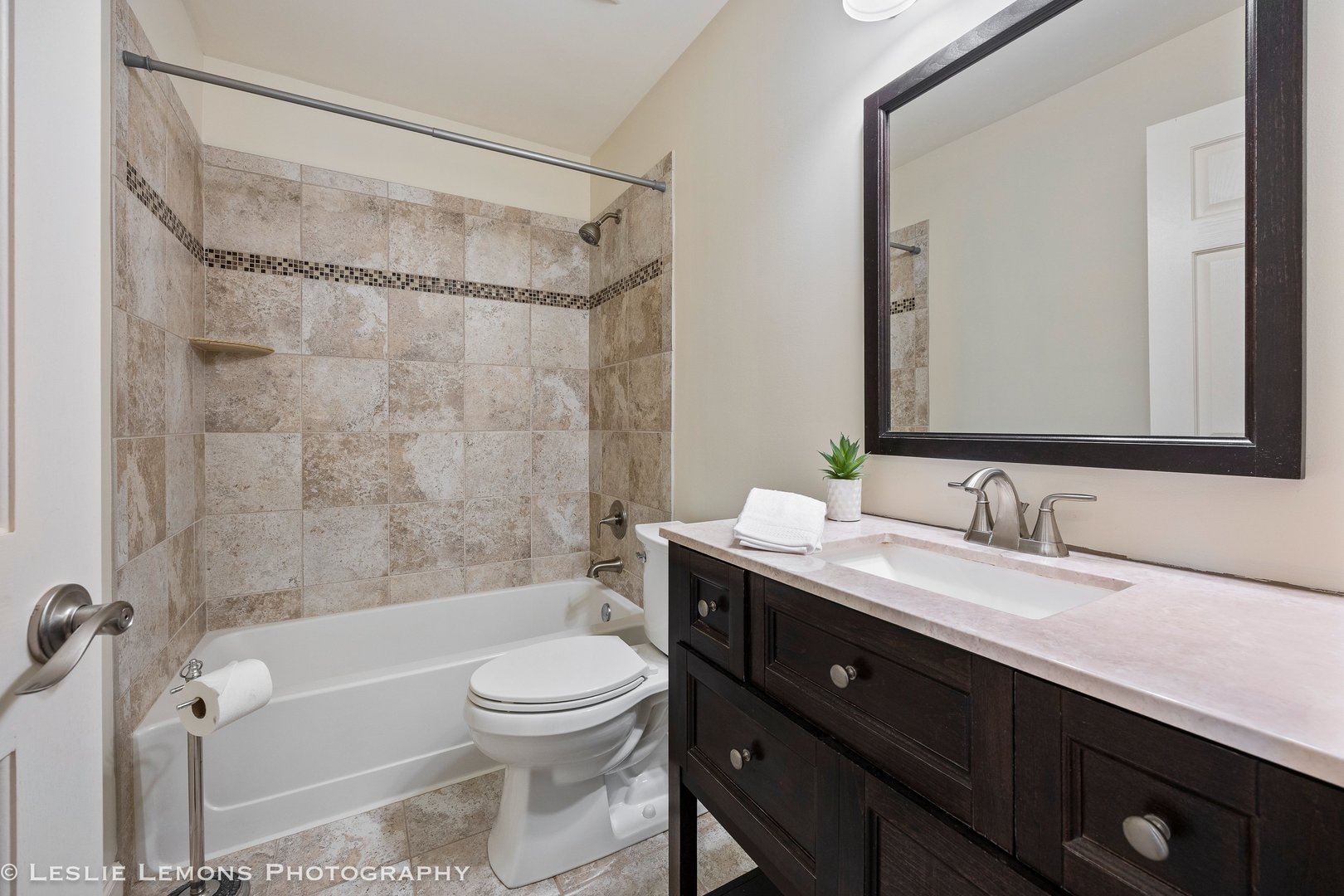 1940 Baldwin Way Bolingbrook, IL 60490 - Photo 16 of 28 a bathroom with a granite countertop sink a toilet and shower