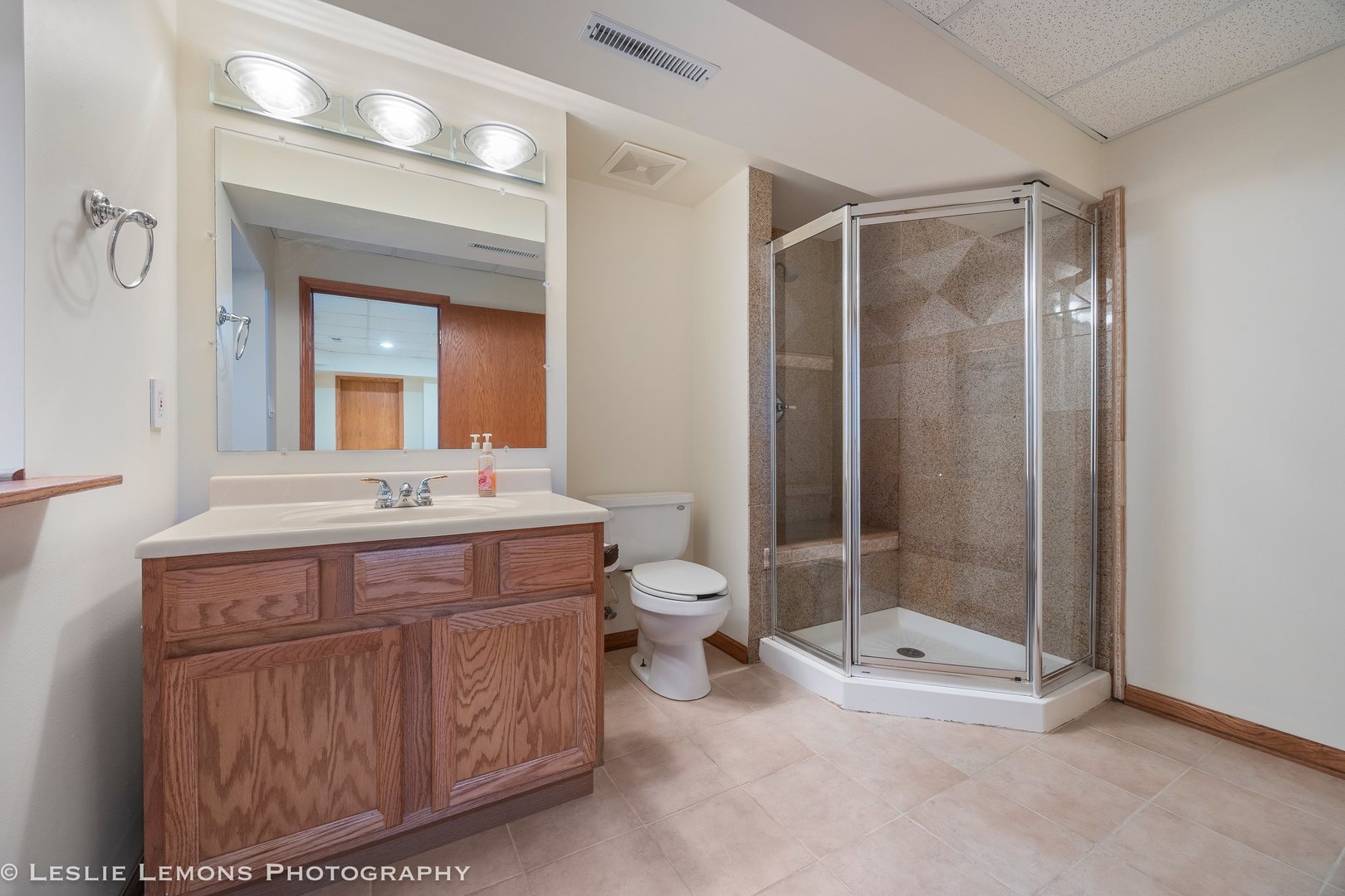 1940 Baldwin Way Bolingbrook, IL 60490 - Photo 23 of 28 a bathroom with a double vanity sink mirror and toilet