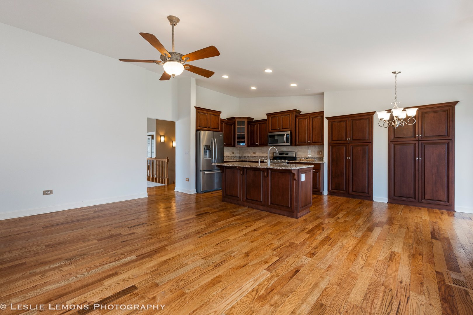 1940 Baldwin Way Bolingbrook, IL 60490 - Photo 9 of 28 a kitchen with stainless steel appliances kitchen island granite countertop a refrigerator and a stove top oven