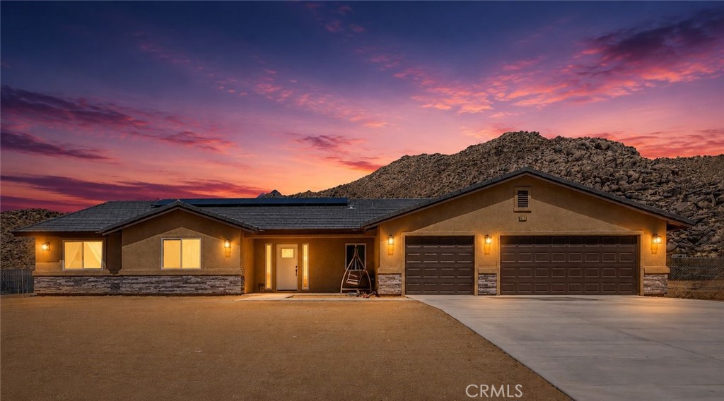 Built in 2022 and maintained in like-new condition, this stunning custom home captures panoramic valley views from one of Apple Valley's most scenic settings.