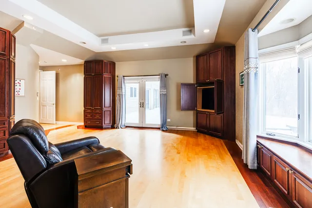 a room with furniture and a flat screen tv