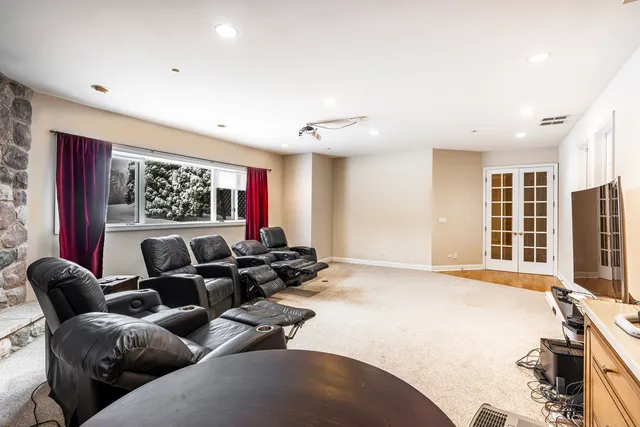 a living room with furniture window and flat screen tv