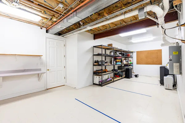 a view of an empty room with storage