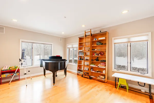 a view of a livingroom with furniture and a window