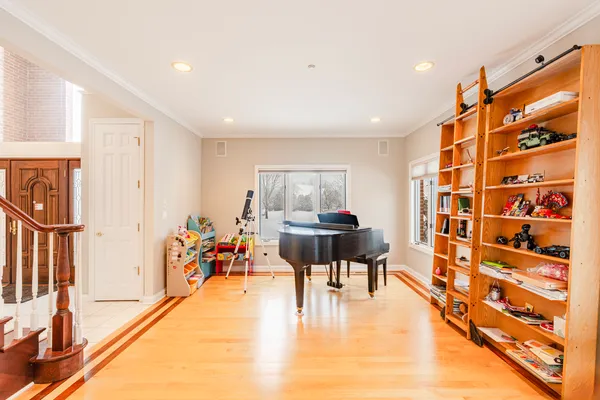 a view of a livingroom with furniture and a window