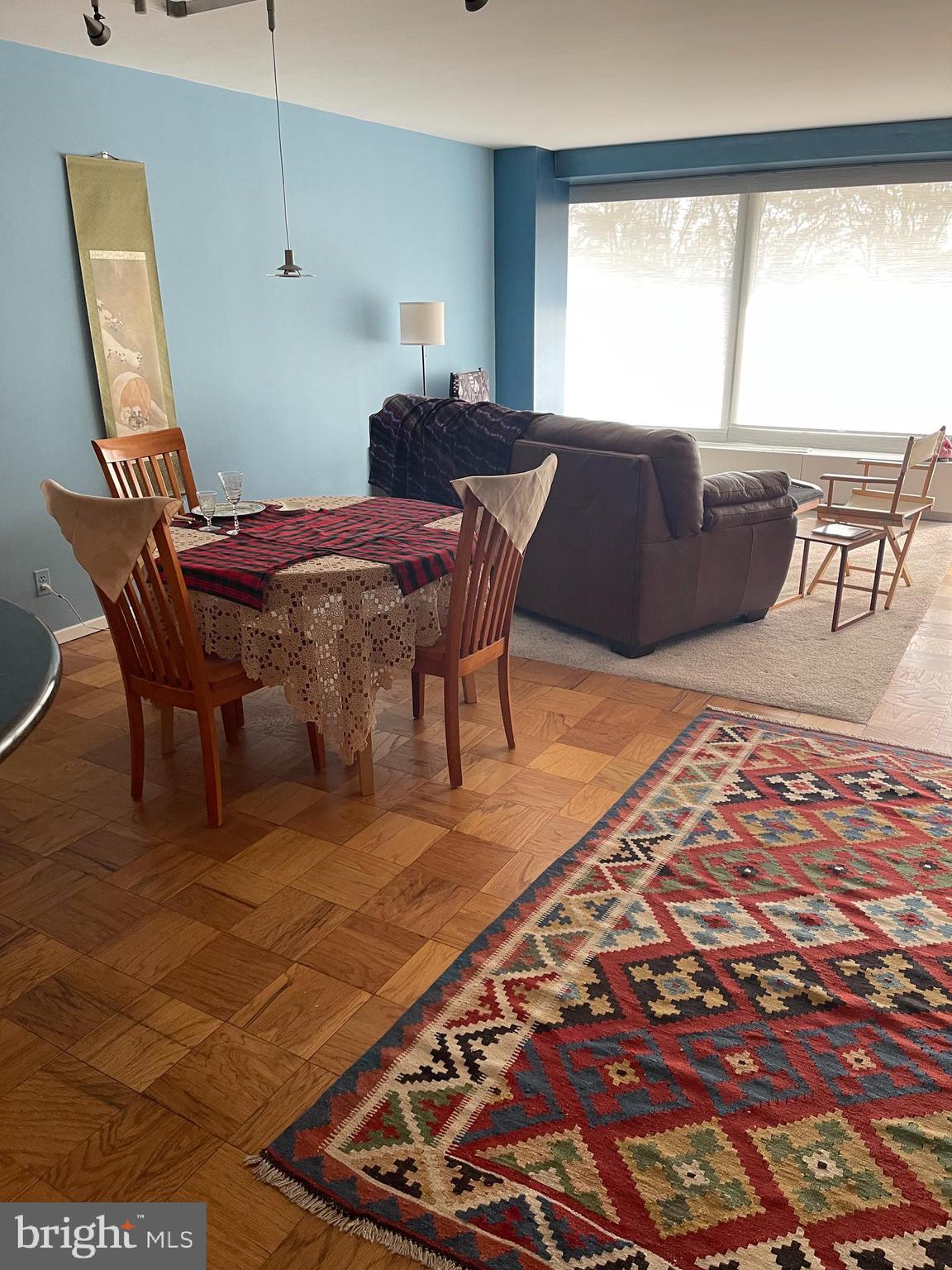 1425 4th Street Southwest, Unit A210 Washington, DC 20024 - Photo 12 of 43 a living room with furniture and wooden floor