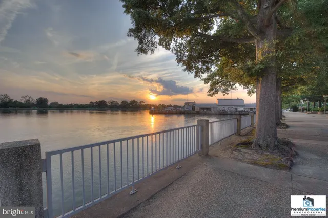a view of a street next to a lake view