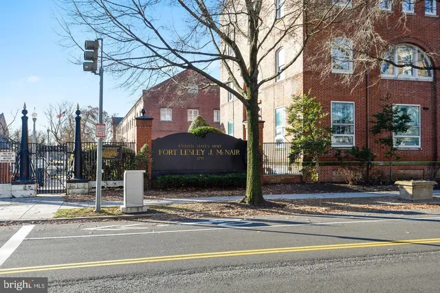 a sign on the side of a street