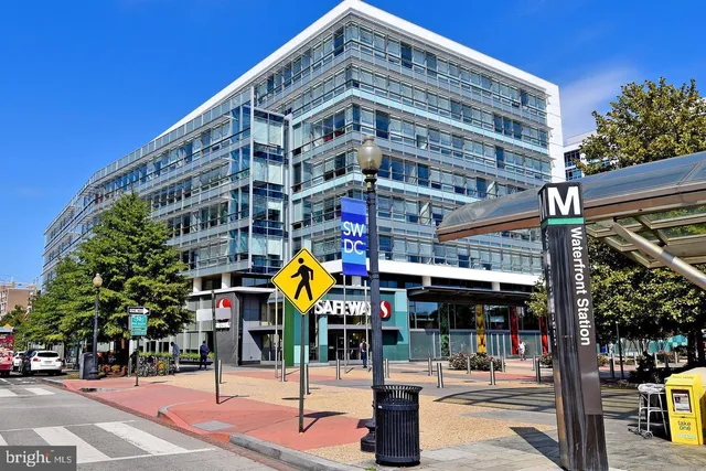 a front view of building with street