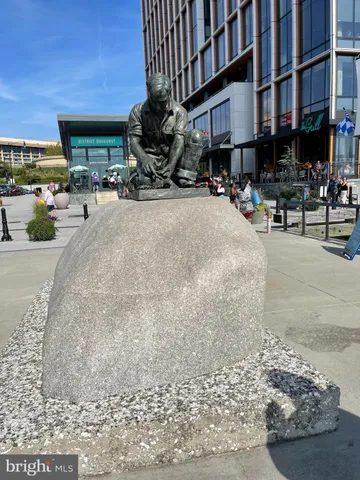 a view of the street with cars