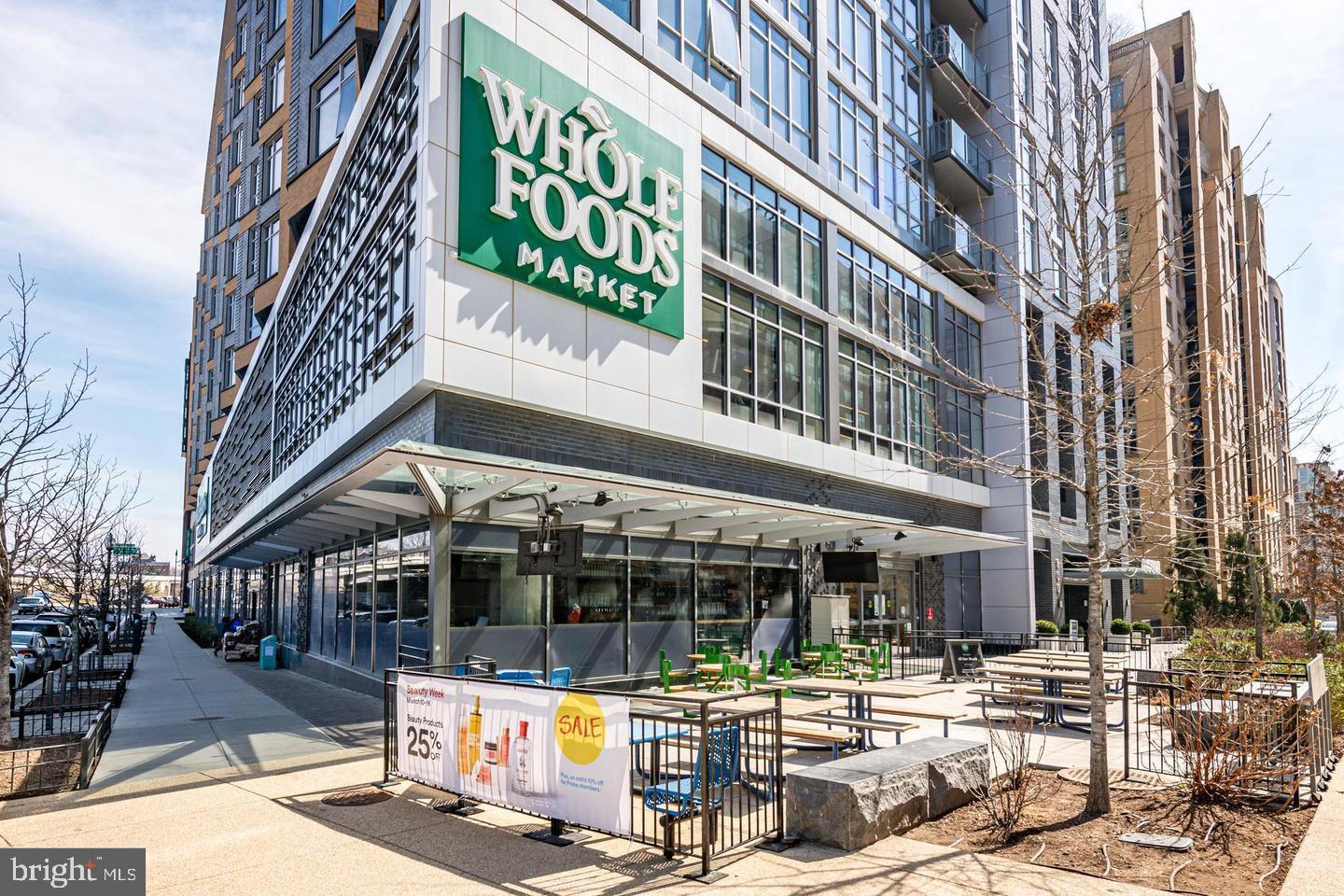 1425 4th Street Southwest, Unit A210 Washington, DC 20024 - Photo 41 of 43 a view of a building with a umbrellas on a street