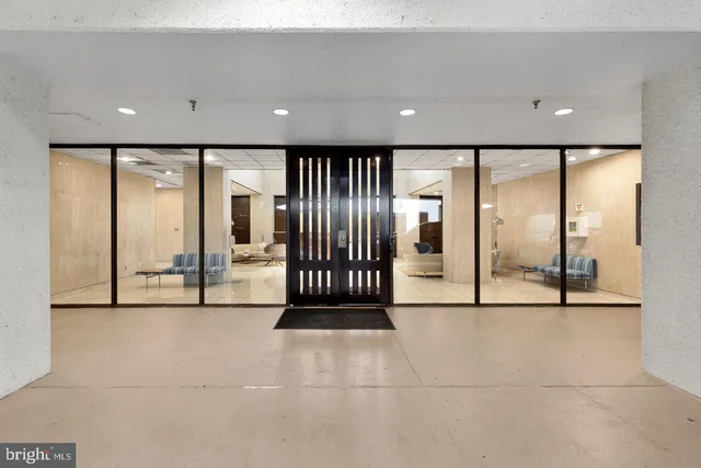 a view of an empty room with a balcony