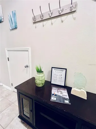 a view of a workspace with furniture