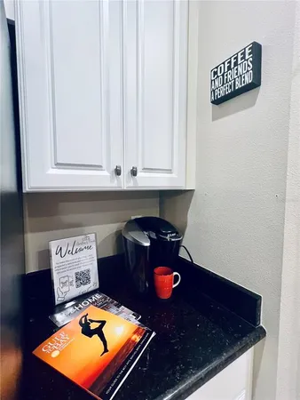 a kitchen with a stove and cabinets