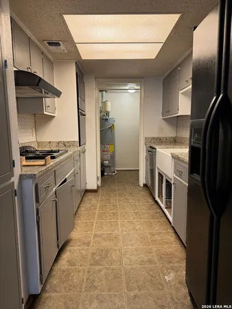 a view of room with storage and utility