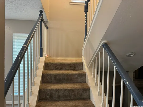a view of an entryway with staircase