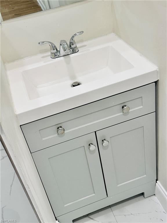 826 Wiggins Pass Road, Unit 310 Naples, FL 34110 - Photo 15 of 18 Bathroom view of vanity