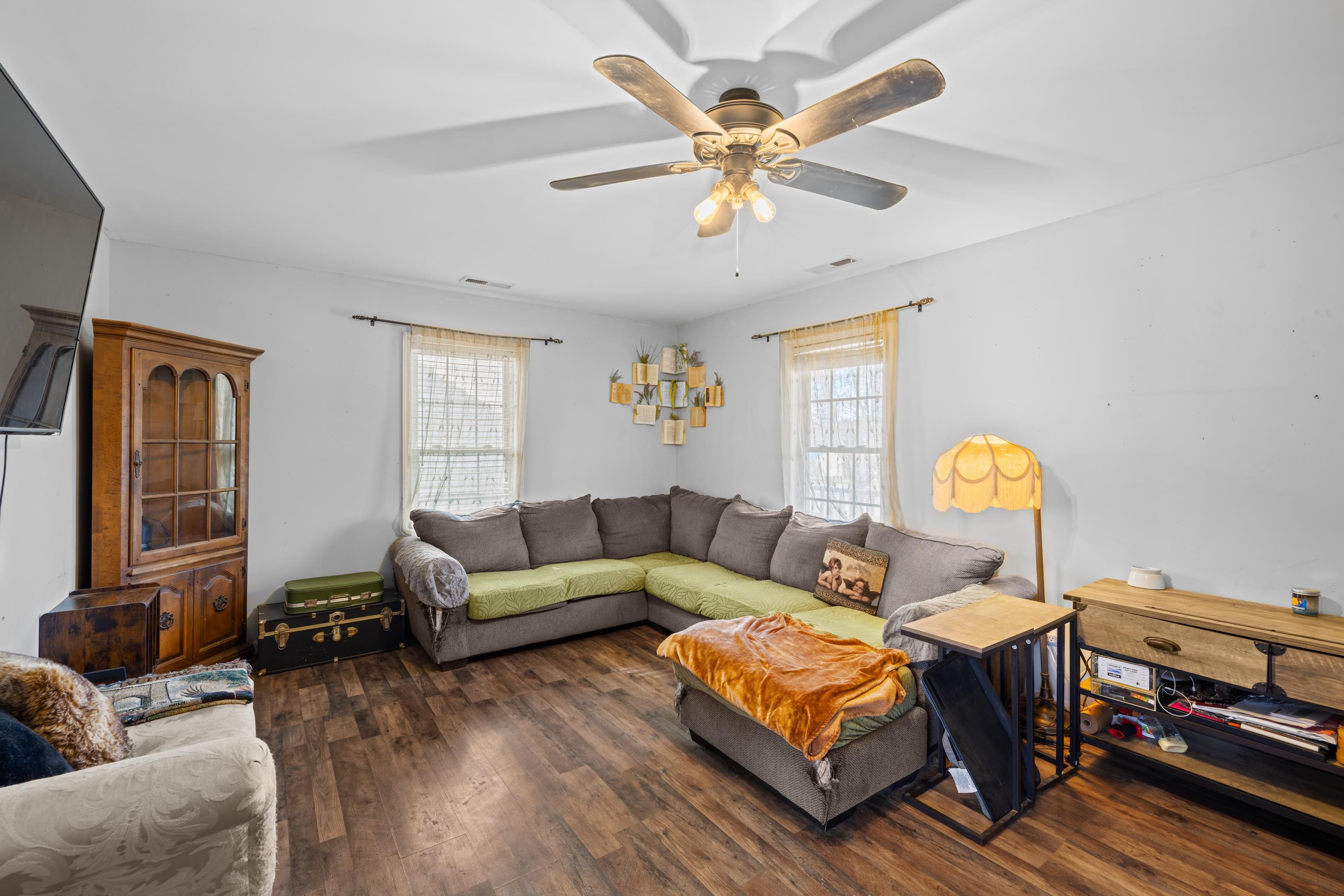 1520 3rd Street Waynesboro, VA 22980 - Photo 9 of 55 a living room with furniture a chandelier and a window
